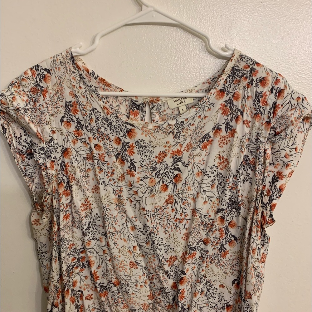 White flowered top